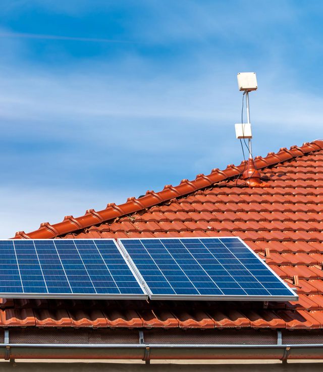 solar panels on the roof of a family house.